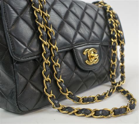 chanel bag black gold chain|chanel black classic quilted handbag.